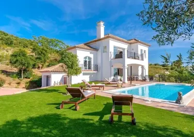 a villa with a swimming pool and a house at Villa exclusiva con piscina privada, La Tina Golf in Arcos de la Frontera