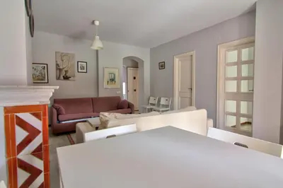 a living room with a couch and a table at Apartamentos Aloha2 El Puerto de Santa Maria in El Puerto de Santa María