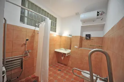 a bathroom with a shower and a sink at Apartamentos Casa Rosaleda in Jerez de la Frontera