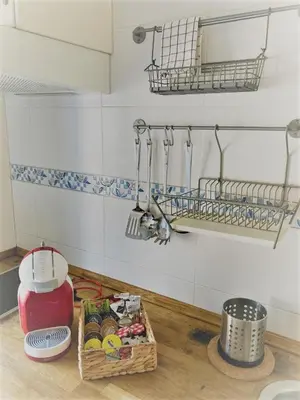 a kitchen counter with a box of food on the floor at El Envero Apartamento in Jerez de la Frontera