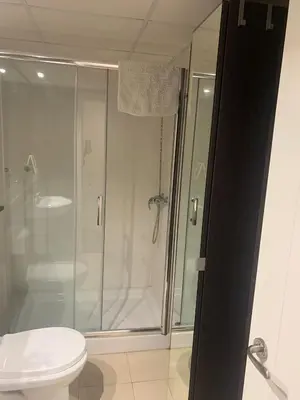 a bathroom with a shower and a toilet at Estudio Alameda in Cádiz