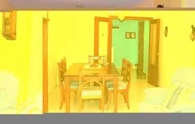a dining room with a wooden table and chairs at Cozy Apartment In Jerez De La Frontera in Jerez de la Frontera