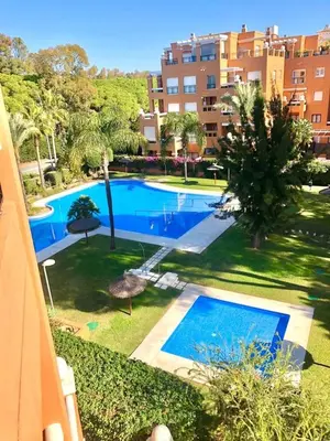 an aerial view of a swimming pool in a resort at GATU PREMIUM Atico Sotavento playa, parking, terraza, piscinas, wifi y aire acc , 