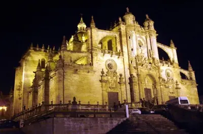a large building with stairs in front of it at night at Palma 2 sueños in Jerez de la Frontera