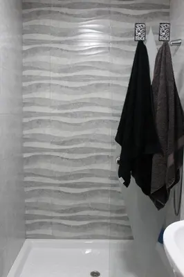 a bathroom with a shower with a glass door at Luxury apartament in Cádiz