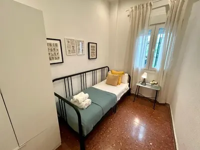 a kitchen with white cabinets and a blue tile floor at GATU El Galeno Del Puerto 4 dormit, 2 baños, aire acc en el centro histórico, 