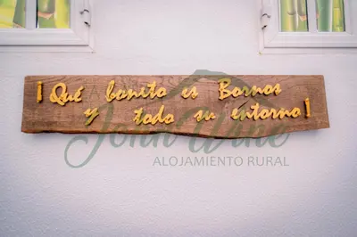a sign that reads i gottin a bunch of books i took at home at La casa de John Wine , Bornos (Spain) in Bornos