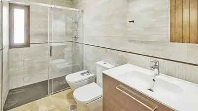 a bathroom with a toilet and a sink and a shower at Casa Merce Conil de la Frontera by Ruralidays in Conil de la Frontera