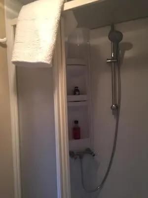 a shower in a bathroom with a sink and a shower at Chiclana Mobile House - Piscina , Wi-Fi, Relax in Chiclana de la Frontera