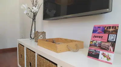 a table with a wooden box on top of it at Sherryflat C/Larga in Jerez de la Frontera