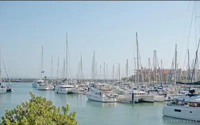 a bunch of boats are docked in a harbor at JMC Apartamento CENTRO HISTÓRICO in El Puerto de Santa María
