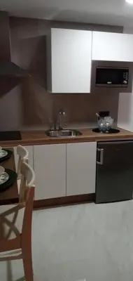 a kitchen with a sink and a counter top at ESTUDIO Jacuzzi SOL De JEREZ in Jerez de la Frontera