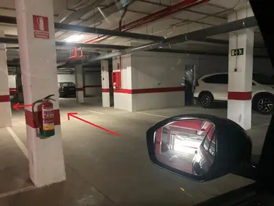 a car is parked in a parking garage at Chipiona Santuario de Regla Playa Bajo A in Chipiona