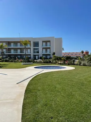 a walkway in front of a large building at LyriosHomes Luxury Costa Ballena Beach in Chipiona