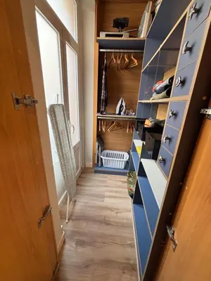 a hallway with a blue dresser in a room at PRECIOUS AND ORIGINAL APARTMENT CENTER in Cádiz