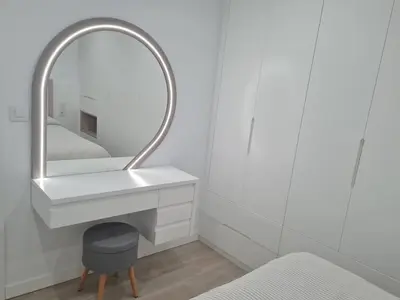 a bathroom with a sink and a mirror at Casa Viento de Levante in Cádiz