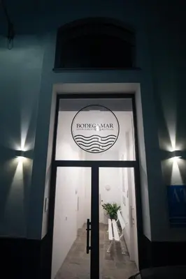 a door to a building with a sign on it at Bodega Mar - Velo de Flor in Sanlúcar de Barrameda