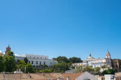 a view of a city with white buildings at Sunflowers in Sanlúcar de Barrameda