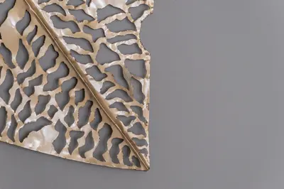 a close up of a metal object with patterns on it at Cádiz Bahía by QHotels in Cádiz