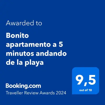 a screenshot of a phone with the text awarded to bontina apartmentota at Playa Apartamento Lidia in Cádiz
