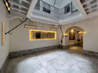 a room with white walls and a ceiling at El Rincón de Fabio Little Apartments in Cádiz