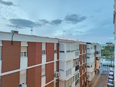 a row of apartment buildings in a city at Laguna 3 dormitorios Acogedor in Cádiz