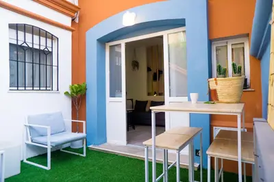 a room with a table and a table and chairs at R&B Puerto Sherry Abohem in El Puerto de Santa María