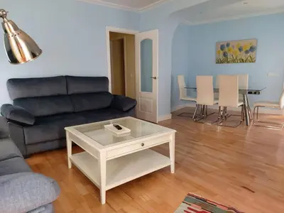 a living room with a couch and a coffee table at Cádiz San Pedro in Cádiz