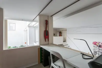 a room with a white desk and a window at Eva Recommends Sanlúcar City & Pool in Sanlúcar de Barrameda