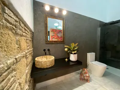 a bathroom with a sink and a toilet at Casa Palacio Ánima in Jerez de la Frontera