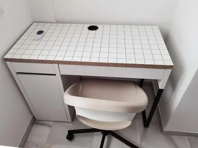a bathroom with a toilet and a white counter at Piso San Roque in Sanlúcar de Barrameda