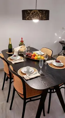 a black table with a bowl of fruit on it at el 2 de Flamenco BajoB in Cádiz