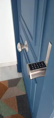 a door with a door handle on a blue door at el 2 de Flamenco 1ºB in Cádiz