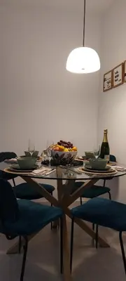 a dining room table with a plate of food on it at el 2 de Flamenco 1ºA in Cádiz