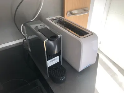 a toaster sitting on a counter next to a toaster at Torredelfino in Jerez de la Frontera