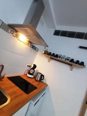 a kitchen with a sink and a counter top at Casa Reyes in Rota