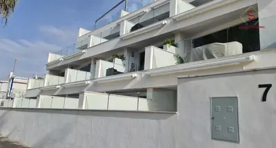 a building with balconies on the side of it at Arenas de Doñana by Sanlúcar Housing in Sanlúcar de Barrameda