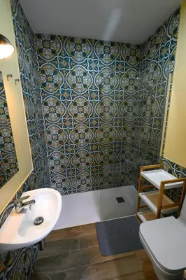 a bathroom with a sink and a toilet at La Fuente Apartamento Jerez in Jerez de la Frontera