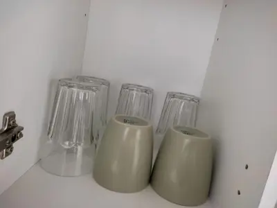 three glass vases sitting on top of a counter at El Tabanquito in Jerez de la Frontera