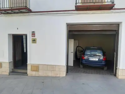 a car is parked inside of a garage at LOFT LA CATEDRAL - Parking disponible in Jerez de la Frontera