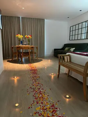 a living room with a floor with fall leaves on the floor at Apartamentos Turísticos La Plaza in Chipiona