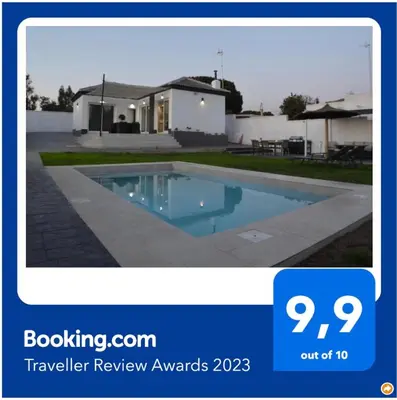 a picture of a house with a swimming pool at EL ENCANTO Chiclana II in Chiclana de la Frontera