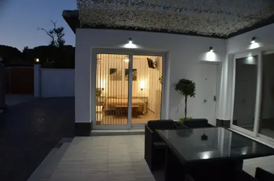 a living room with a view of a bedroom at EL ENCANTO Chiclana II in Chiclana de la Frontera