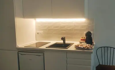 a kitchen with a sink and a counter top at Casa Mundaka in Sanlúcar de Barrameda