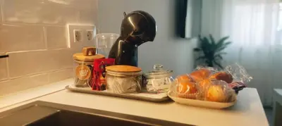 a counter top with a tray of food and a helmet at Casa Mundaka in Sanlúcar de Barrameda