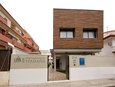 a building with a sign that reads la escacienda at Apartamentos La Espadaña in Rota