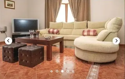 a living room with a couch and a table at HIDALMAR in Arcos de la Frontera