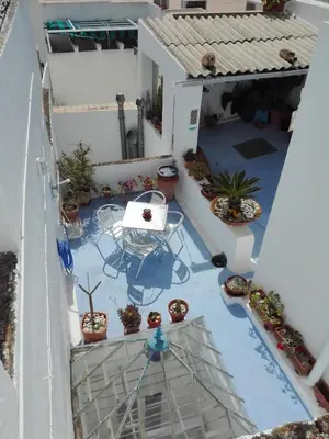 an overhead view of a patio with potted plants at Barroso 4 by 7Escalones in Rota
