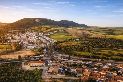 an aerial view of a town in the hills at El Mirador del Valle in San Jose del Valle
