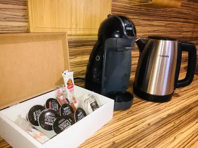 a coffee maker and a tea kettle on a counter at Loft con encanto cerca del centro + Parking in Jerez de la Frontera